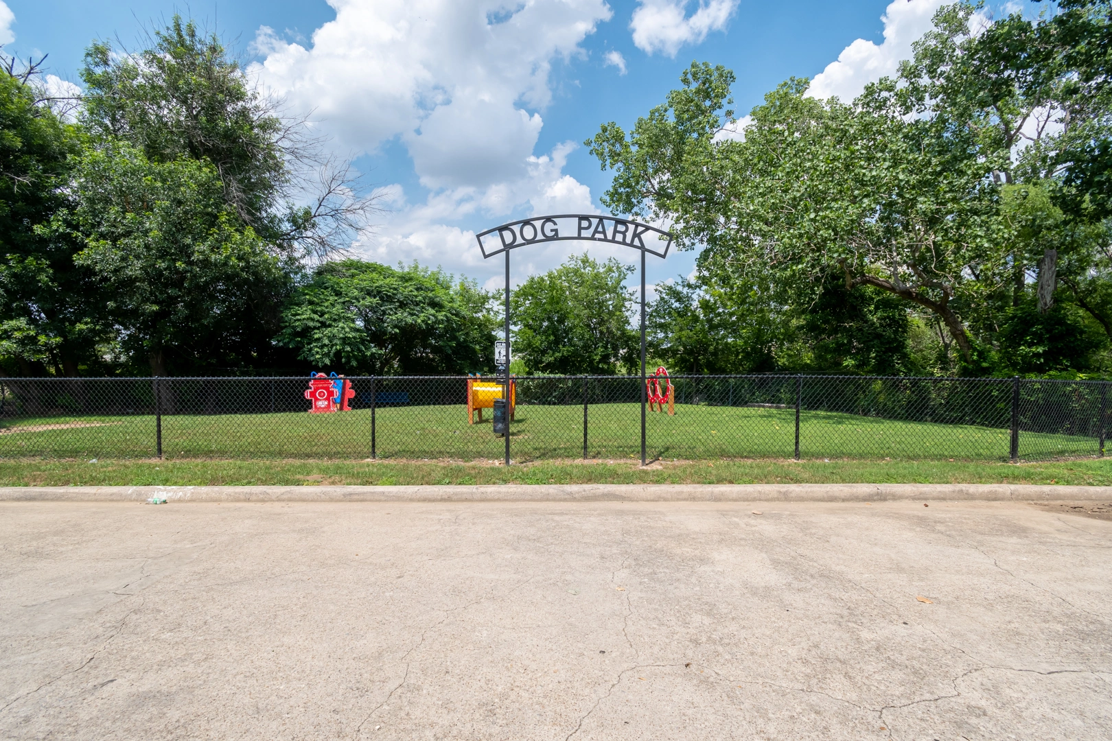 Fenced dog park at Crossings at Irving in Irving, Texas