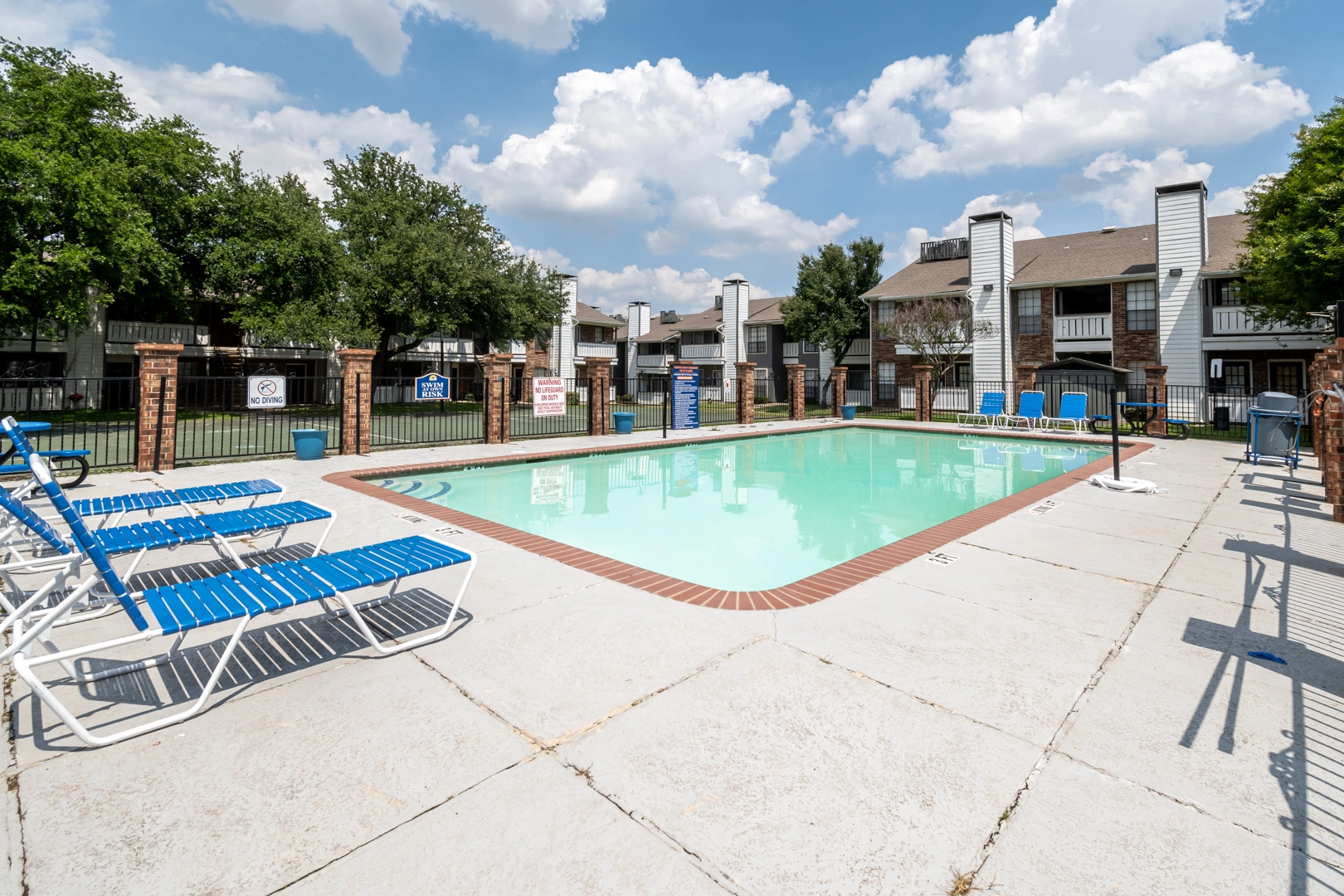 Swimming pool and sundeck at Crossings at Irving in Irving, Texas